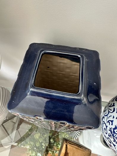 Blue and gold square lidded jar.
