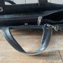 Tula black leather tote bag with a shoulder strap. Image 7
