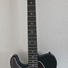 Electric guitar left hand