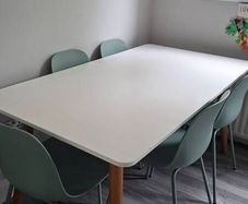 White top Rectangular Dining table from EZ Living Interiors with wooden legs