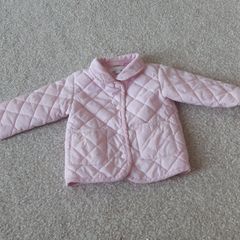 Baby girls pink quilted jacket.