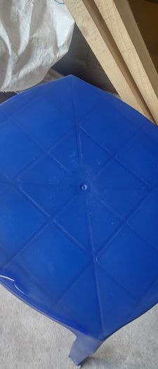 Blue plastic table . please read description