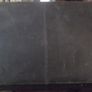 a black leather briefcase Image 3