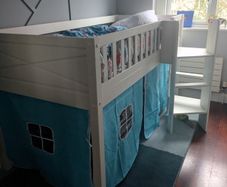 Mid sleeper bed with slide