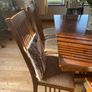 Beautiful long dark Oak Dining table and 8 chairs Image 7