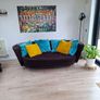 Fama curved designer sofa for sale...absolutely giveaway due to construction works . Image 2