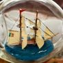 Miniature Antique Tall Ship in a Triangular Dimpled Bottle Image 4