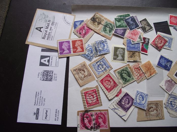 A box with collection of stamps from Great Britain