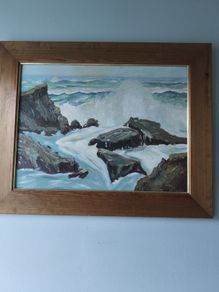 Lovely oil on board of sea weave hating rocks singed M Carey.