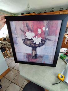 Lovely Framed Still Life print in Black Frame.