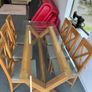 Glass dining room table with 6 chairs Image 3