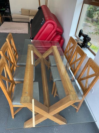Glass dining room table with 6 chairs