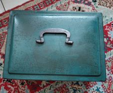 Vintage green metal cash box with key