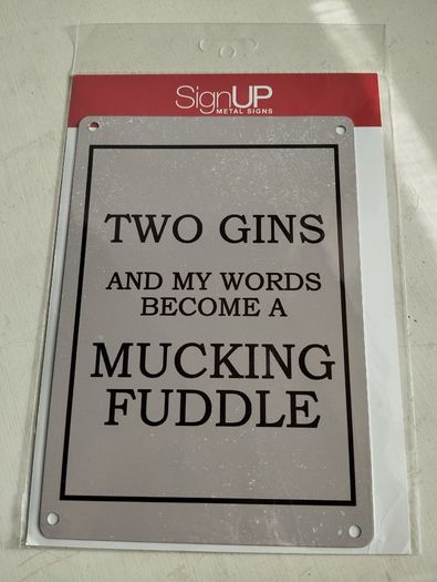 New in original packaging. Two gins and my words become a mucking fuddle sign