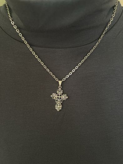 Silver tone chain necklace with rhinestone cross