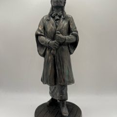sculpture depicting a graduation figure, from the Irish artist Jeanne Rynhart.
