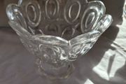 A vintage pressed glass footed bowl.