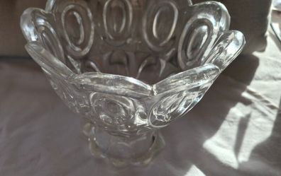 A vintage pressed glass footed bowl.