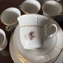 Six piece set of finebone  China, six cups, six saucers, six side plates, one larger plate and sugar bowl. Image 3