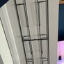 Stylish wall mounted black metal magazine rack Image 3