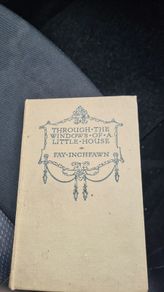 Through The Window Of A Little House By Fay Inch Fawn. Hardback In Good Condition.