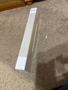 Bathroom light with shaver socket