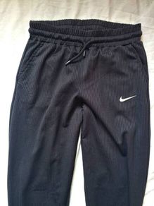 Nike bottoms Black polyester size medium 28" leg in new condition