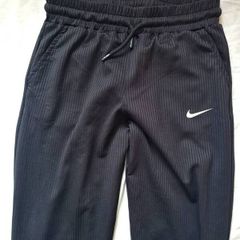Nike bottoms Black polyester size medium 28" leg in new condition