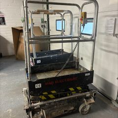 Push around scissor lift