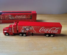 2 die-cast metal models of the Coca-Cola Christmas holiday truck