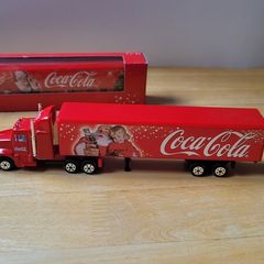 2 die-cast metal models of the Coca-Cola Christmas holiday truck