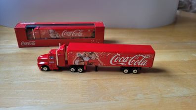 2 die-cast metal models of the Coca-Cola Christmas holiday truck