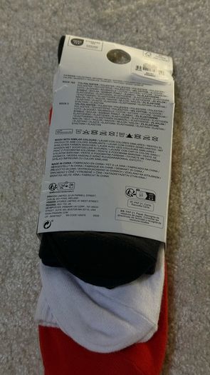 Set of 3 pairs of licensed One Piece socks featuring Straw Hat Pirates graphics.