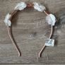 Claires Rose Gold Butterfly Headband with White Flowers Image 2