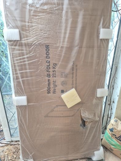 Bi fold shower door