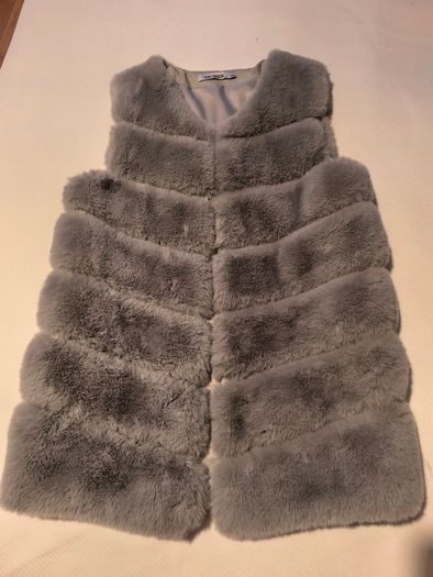 Woman sleeveless vest