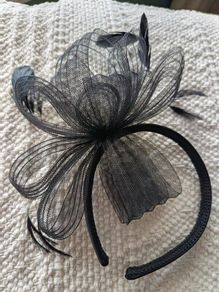 Black feather fascinator