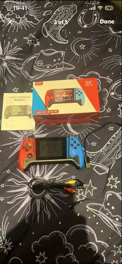 Small handheld gaming device with 500 games