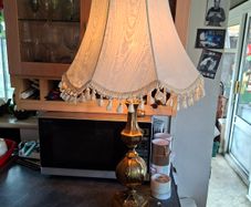 A Beautiful Large Heavy Victorian-style Brass Table Lamp with Brass Baluster Stem and Faceted, Paneled Knop, raised on a Stepped Hexagonal Base; fitted with a tall, cream textile shade with scalloped fringe and tassel trim, Postage Available or collection