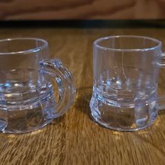 Two plastic shot glasses