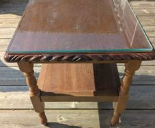 Glass topped coffee table .