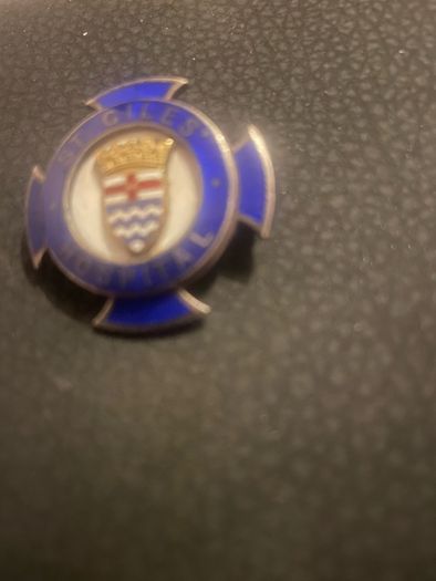 Giles silver nurses badge