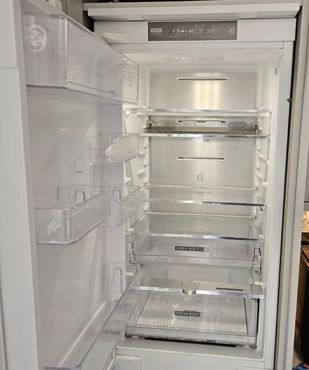 Integrated fridge freezer