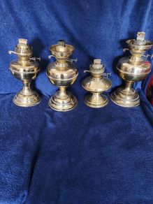 Victoria working oil lamps . All duplex and newly polished.