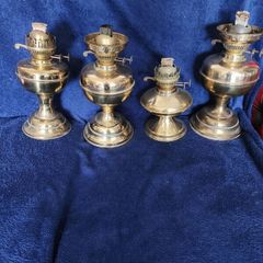 Victoria working oil lamps . All duplex and newly polished.