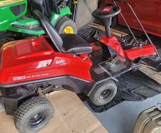 Lawnmower with mechanical brush