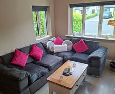 Immaculate Right-Hand Corner Sofa & Matching 2-Seater  Modern grey fabric right-hand corner sofa with matching 2-seater.