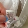 3 dunnes white shirts (new/as new) age 6-7 Image 6