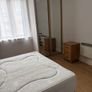 Room with double bed and attached washroom Image 3