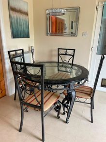 Wrough iron table and 4 chairs
